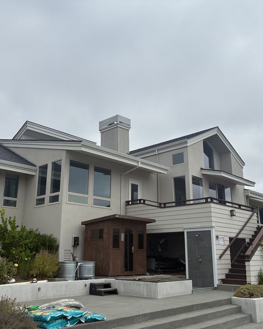 Clean two-story stucco home exterior