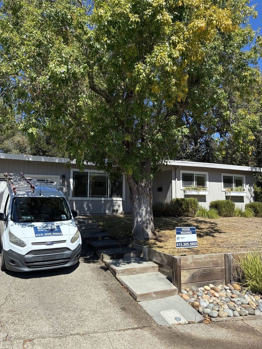 G&J van in front of a single-story Marin home after house washing